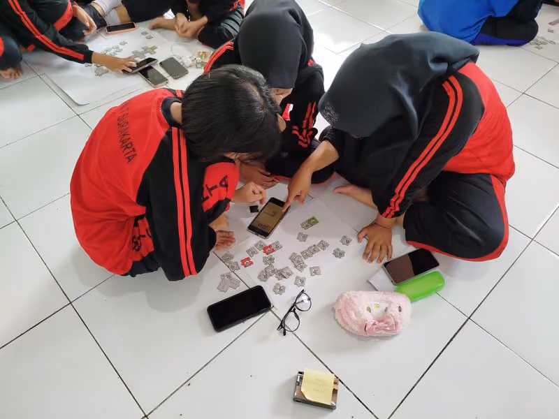 Learners taking part in a Tangible coding session